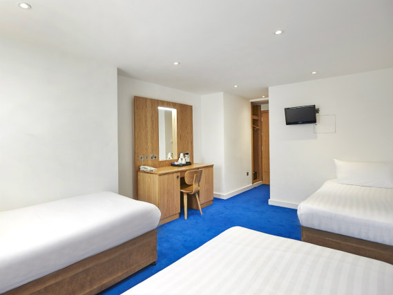A typical quad room at Central Park Hotel London