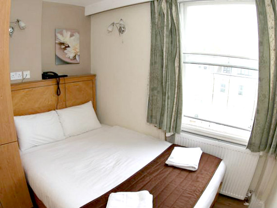 Ein Doppelzimmer im Kensington Suite Hotel