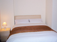 Ein typisches Doppelzimmer mit eigenem Bad im City Stay Hotel London