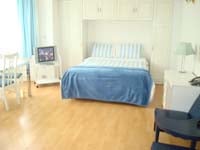A typical double bedroom at the Palace Court Holiday Apartments
