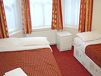 A Triple room at Rex Hotel