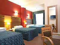 A triple room at Lord Jim Hotel