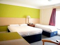 A triple room at Queens Hotel London