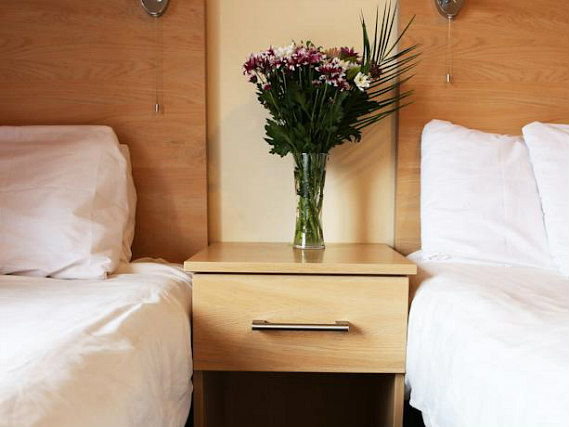 Une chambre avec lits jumeaux de City Inn Express