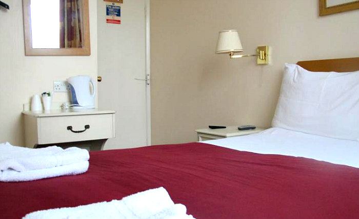 Une chambre à Chiswick Lodge Hotel