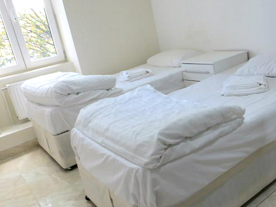 Une chambre avec lits jumeaux de Hammersmith Rooms
