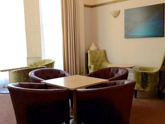 Relax in a communal area at Bluebells Hotel