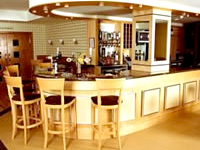 Have a drink in the relaxing bar area Have a drink in the relaxing bar area