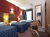 A triple room at Lord Jim Hotel
