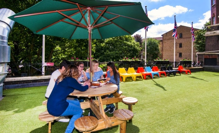 Relax with friends in the private gardens at Rest Up London