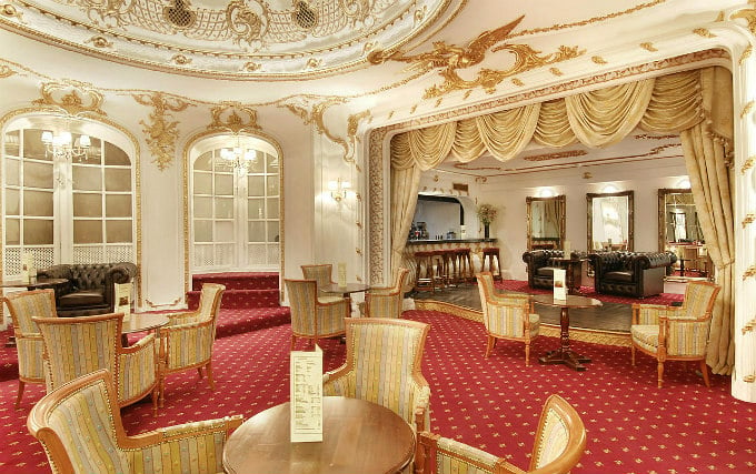 Relax and enjoy your meal in the Dining room at Grand Royale London Hyde Park