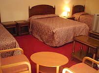 A Typical Quad Room at Norfolk House Hotel