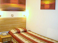 A single room at Queens Park Hotel