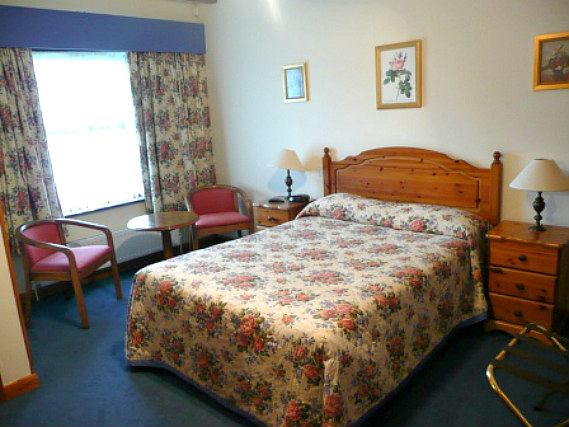 Get a good night's sleep in your comfortable room at Cottage Guest House