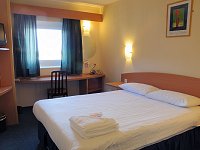 A superior room at Custom House Hotel
