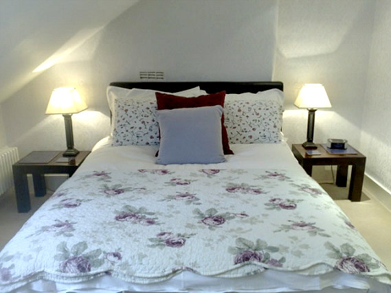 Get a good night's sleep in your comfortable room at The Gardens Guesthouse