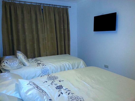 A twin room at Apple House Wembley is perfect for two guests