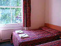 A typical triple room at Palace Court Hotel