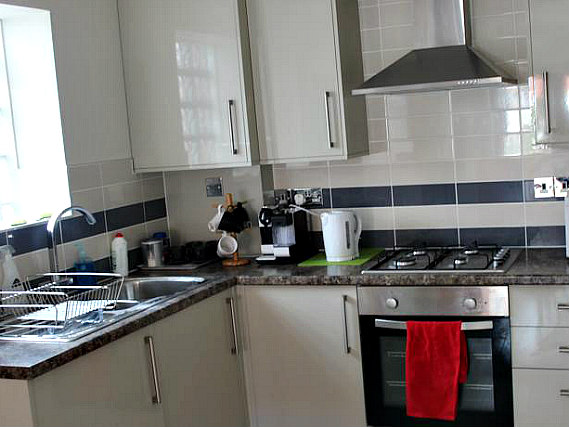 Save even more money by preparing your own food in the self-catering kitchen at London Apartments at Romford