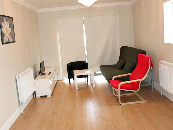 The lounge room at London Apartments at Romford