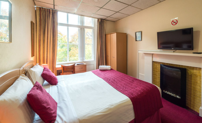 Get a good night's sleep in your comfortable room at Kelvin Hotel West End