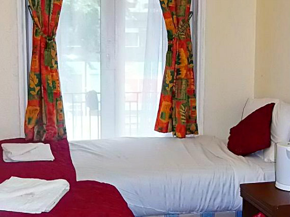A twin room at Victoria Station Hotel is perfect for two guests
