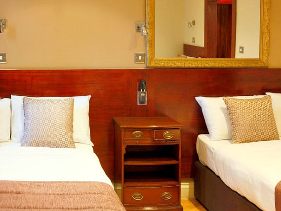 Quad rooms at Garden View Hotel are the ideal choice for groups of friends or families