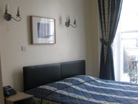 A Typical Double Bedroom at the Glendale Hyde Park Hotel