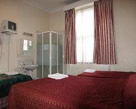 A Typical Quad Room at Colliers Hotel