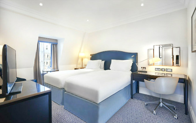 A twin room at The Waldorf Hilton London