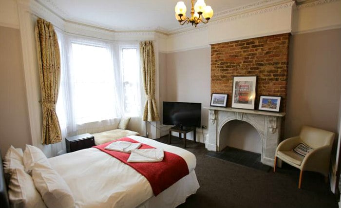 Get a good night's sleep in your comfortable room at Manor House London