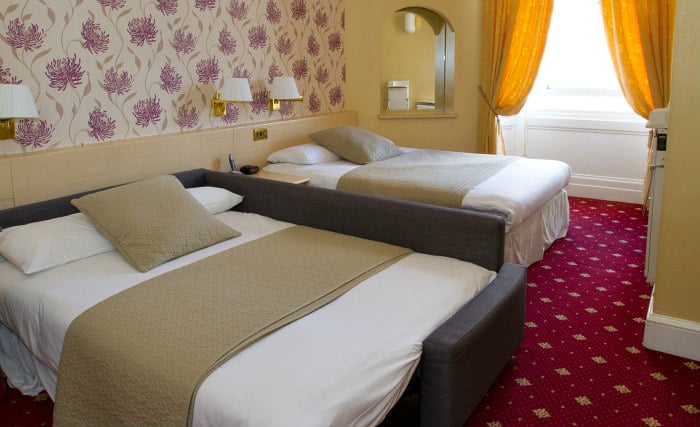 Quad rooms at Manor House London are the ideal choice for groups of friends or families