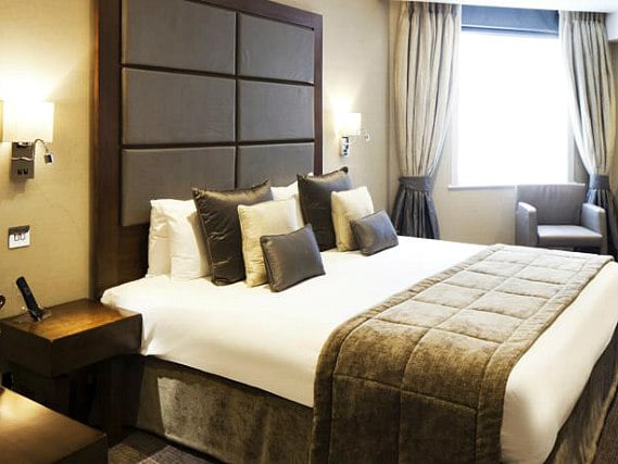 Get a good night's sleep in your comfortable room at Wellington Hotel by Blue Orchid