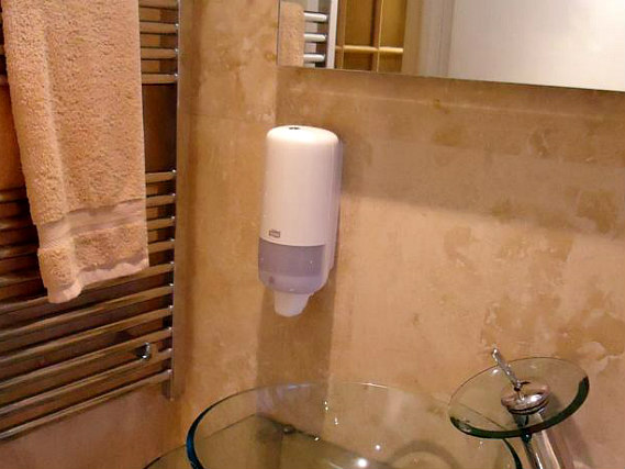 A bathroom at Hour Glass Hotel