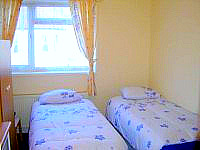 A twin room at Athena Palace Hotel