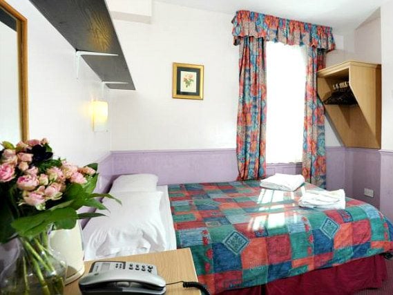 Get a good night's sleep in your comfortable room at Marble Arch Inn