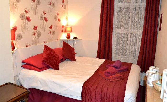 Get a good night's sleep in your comfortable room at Abbey Lodge Hotel