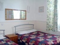 A triple room at Sani Hotel