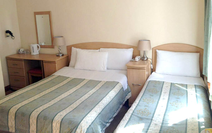 A comfortable triple room at Seven Dials Hotel