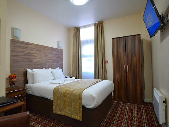 Get a good night's sleep in your comfortable room at Lucky 8 Hotel