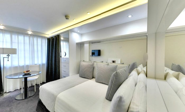 Get a good night's sleep in your comfortable room at Melia White House Hotel
