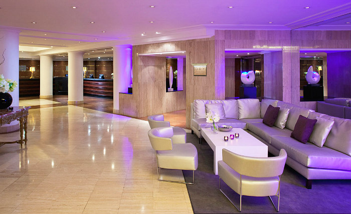 Relax in the lounge at Melia White House Hotel