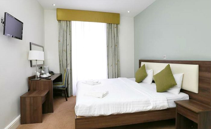 Get a good night's sleep in your comfortable room at Hyde Park Boutique Hotel