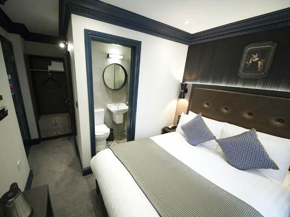 A comfortable double room at The Duke Rooms London