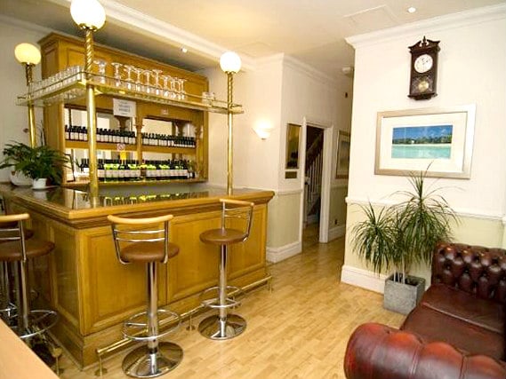 After a busy day, relax with a drink in the bar at Gresham Hotel