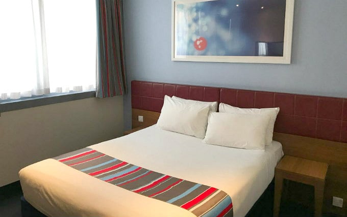 A comfortable double room at Travelodge London Central Aldgate East Hotel