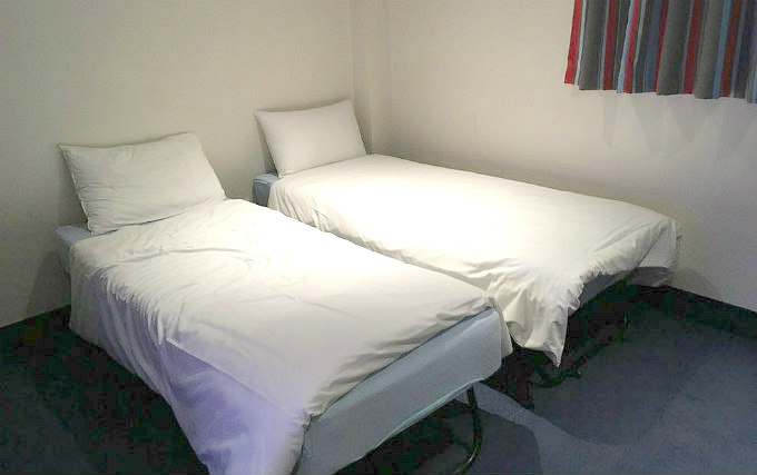 A twin room at Travelodge London Central Aldgate East Hotel