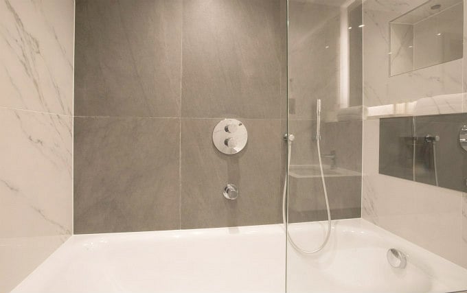 A shower system at Merit Kensington Hotel