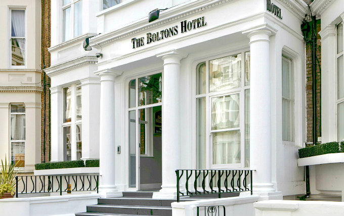 The attractive gardens and exterior of Best Western The Boltons Hotel
