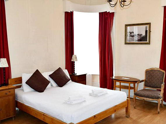 Get a good night's sleep in your comfortable room at Black Lion Guesthouse London